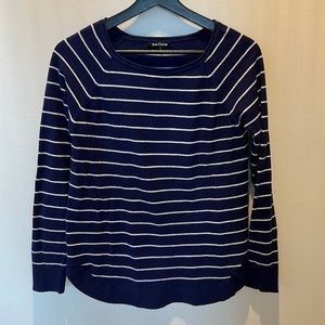 Navy blue boatneck sweater with white stripes